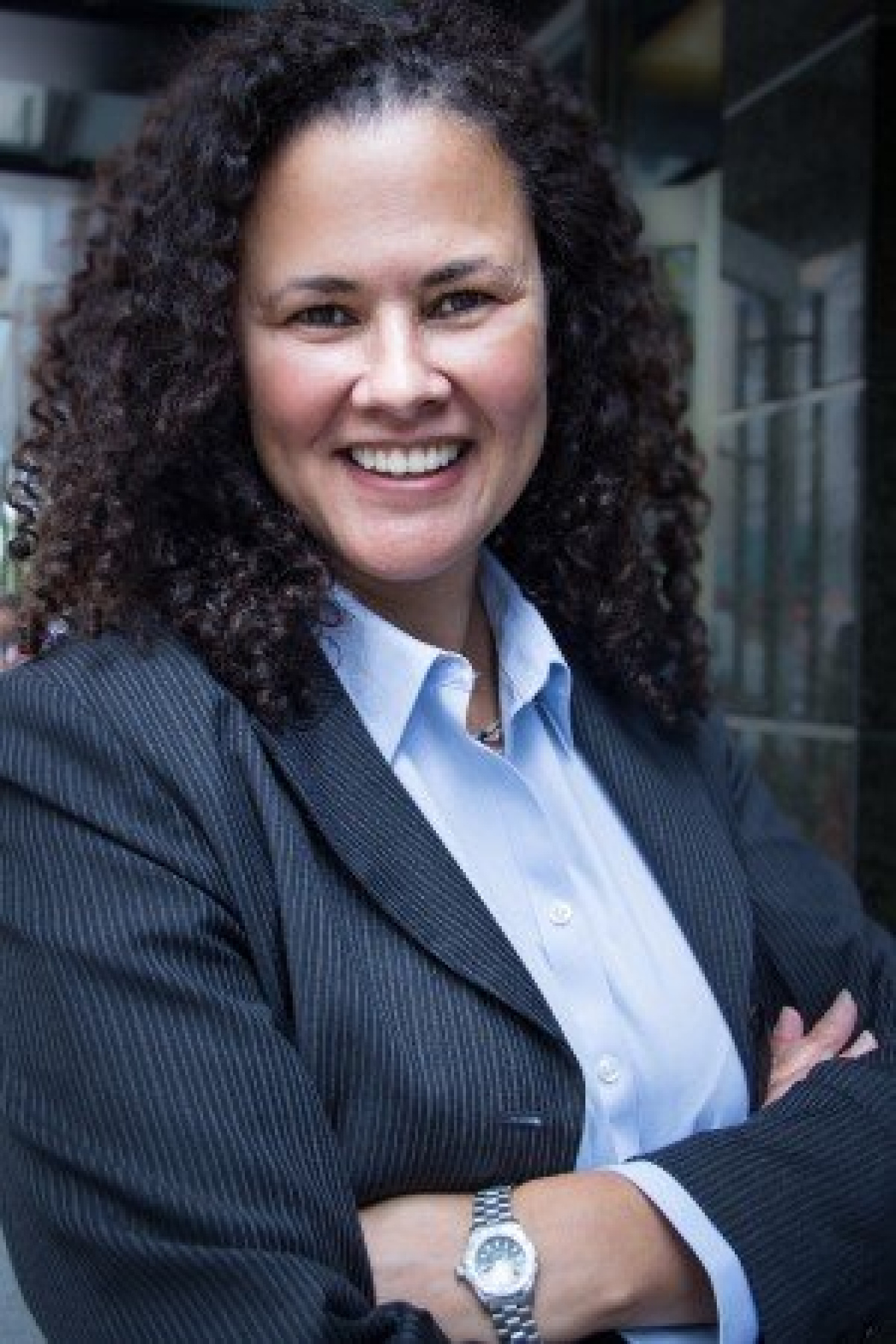 Headshot of a woman smiling.