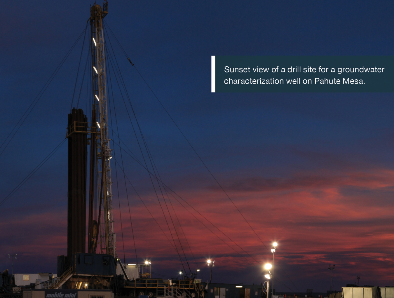 Sunset view of a drill site for a groundwater characterization well on Pahute Mesa.