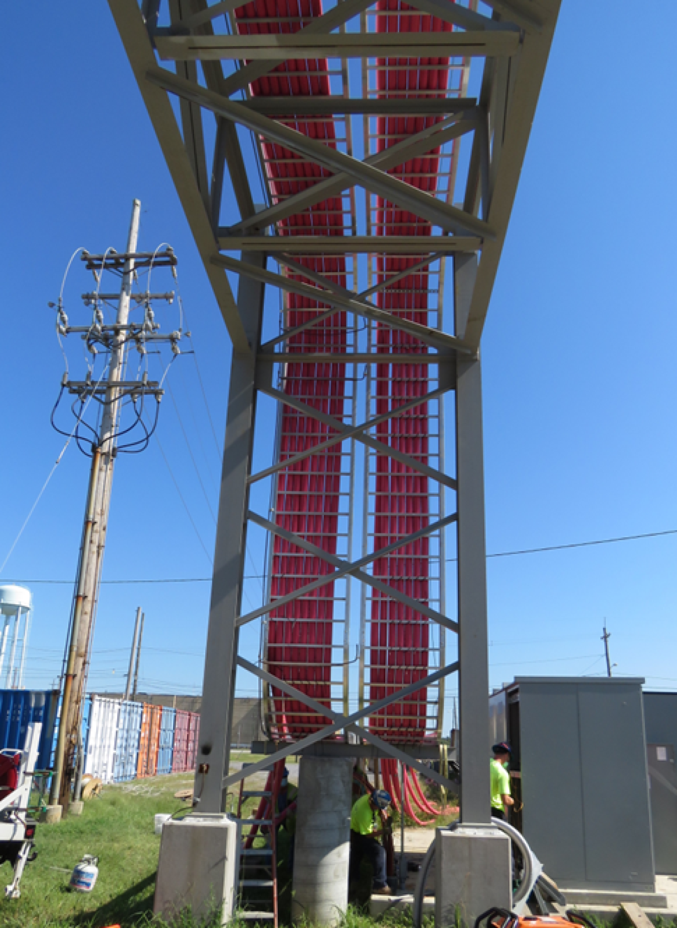 Workers with EM Paducah Site infrastructure support services contractor Swift & Staley finalize completion of a new bypass power distribution system.