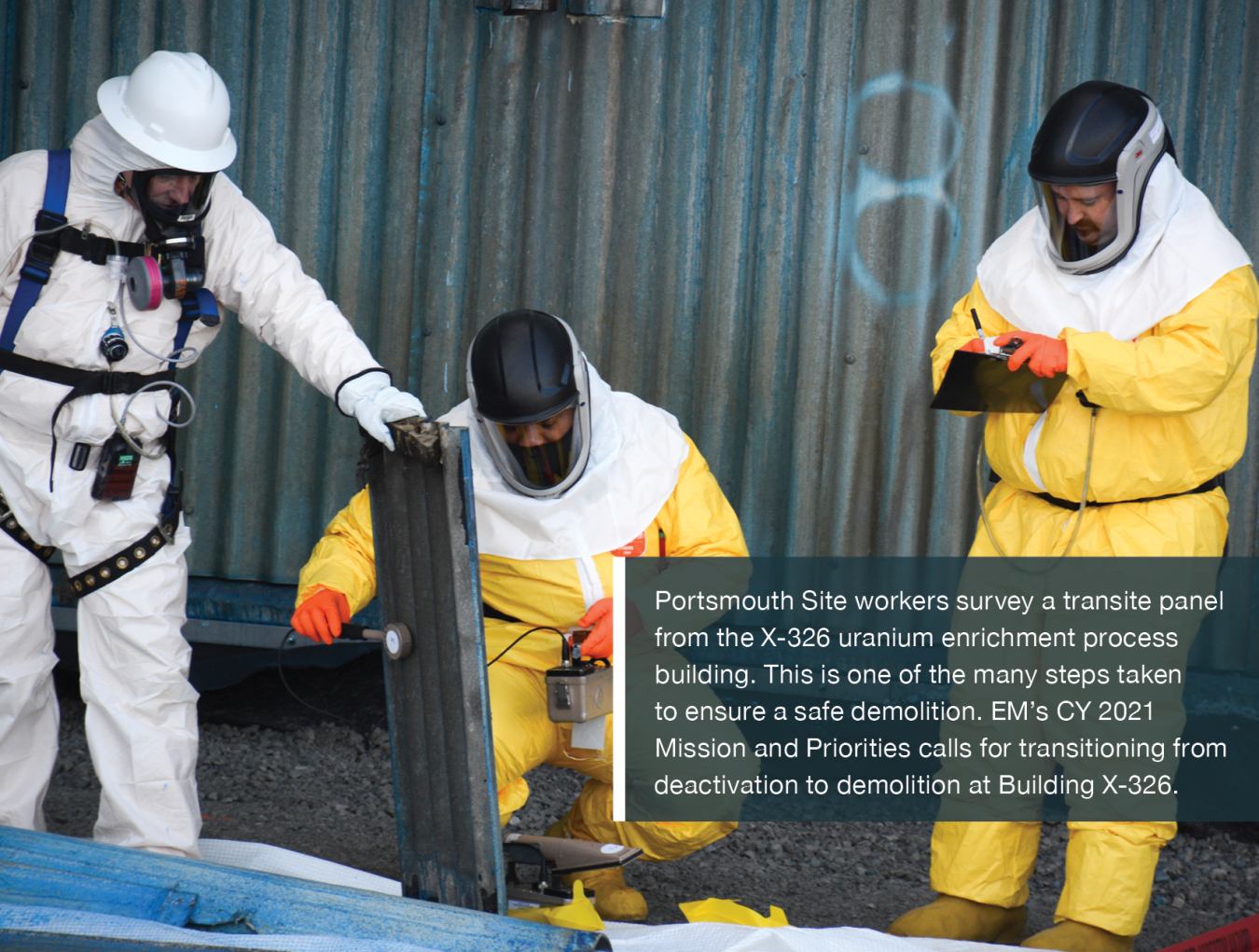 Portsmouth Site workers survey a transite panel from the X-326 uranium enrichment process building. This is one of the many steps taken to ensure a safe demolition. EM’s CY 2021 Mission and Priorities calls for transitioning from deactivation to demolition at Building X-326.