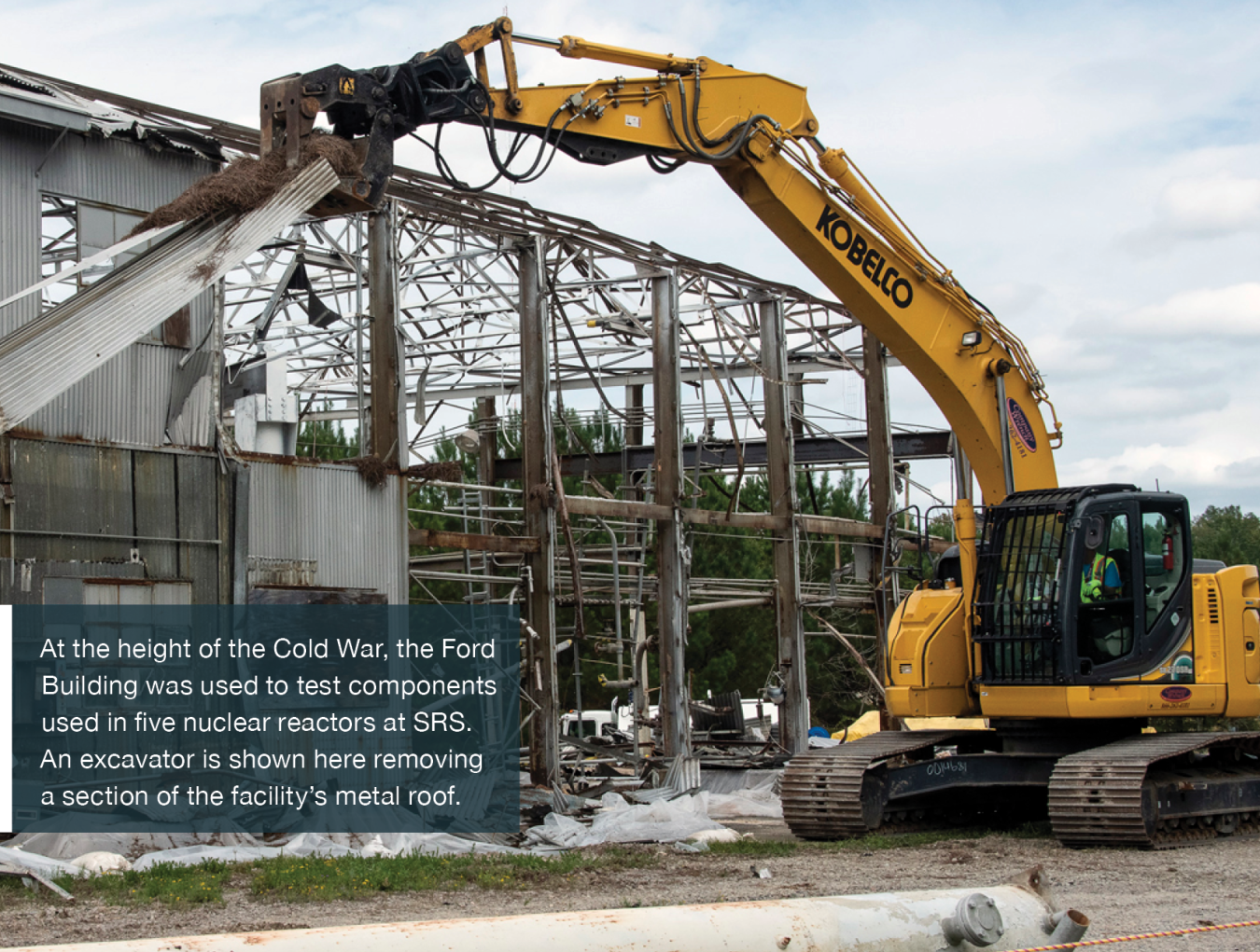 At the height of the Cold War, the Ford Building was used to test components used in five nuclear reactors at SRS. An excavator is shown here removing a section of the facility’s metal roof.