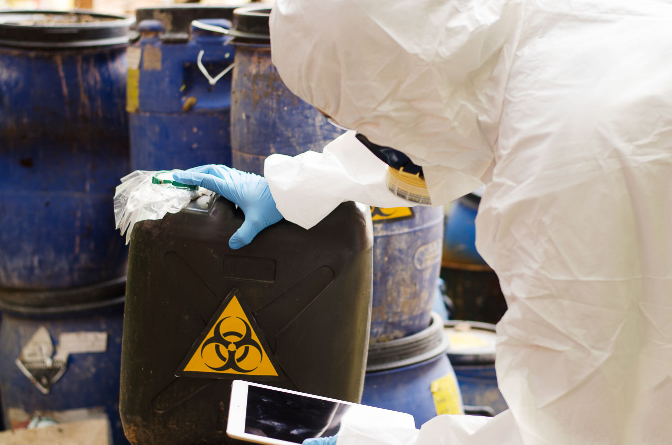Scientist wearing Chemical protection suit check danger chemical, working at dangerous zone