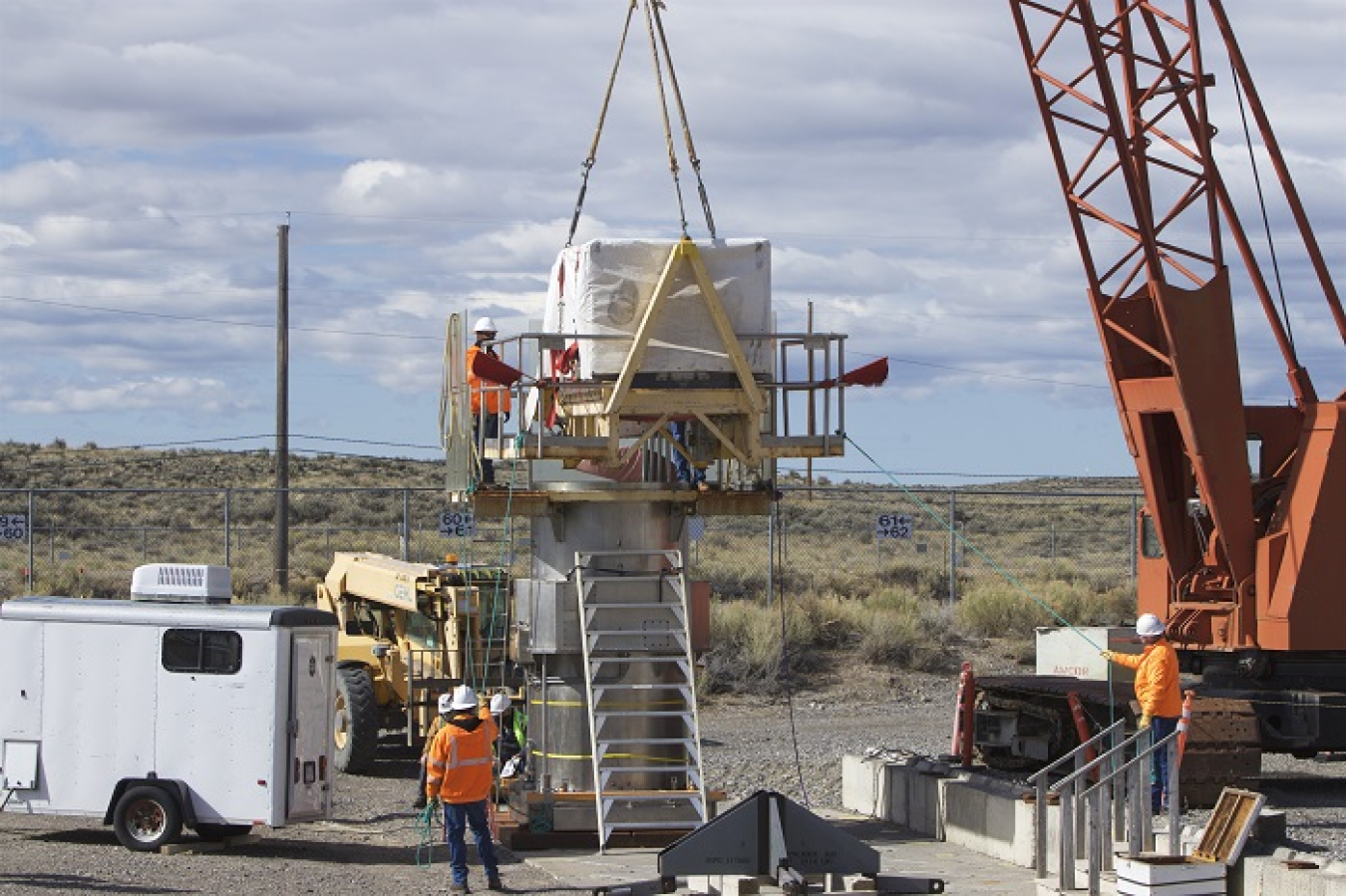 EM crews prepare to place the final waste shipment into a vault at the Subsurface Disposal Area at the Idaho National Laboratory Site.