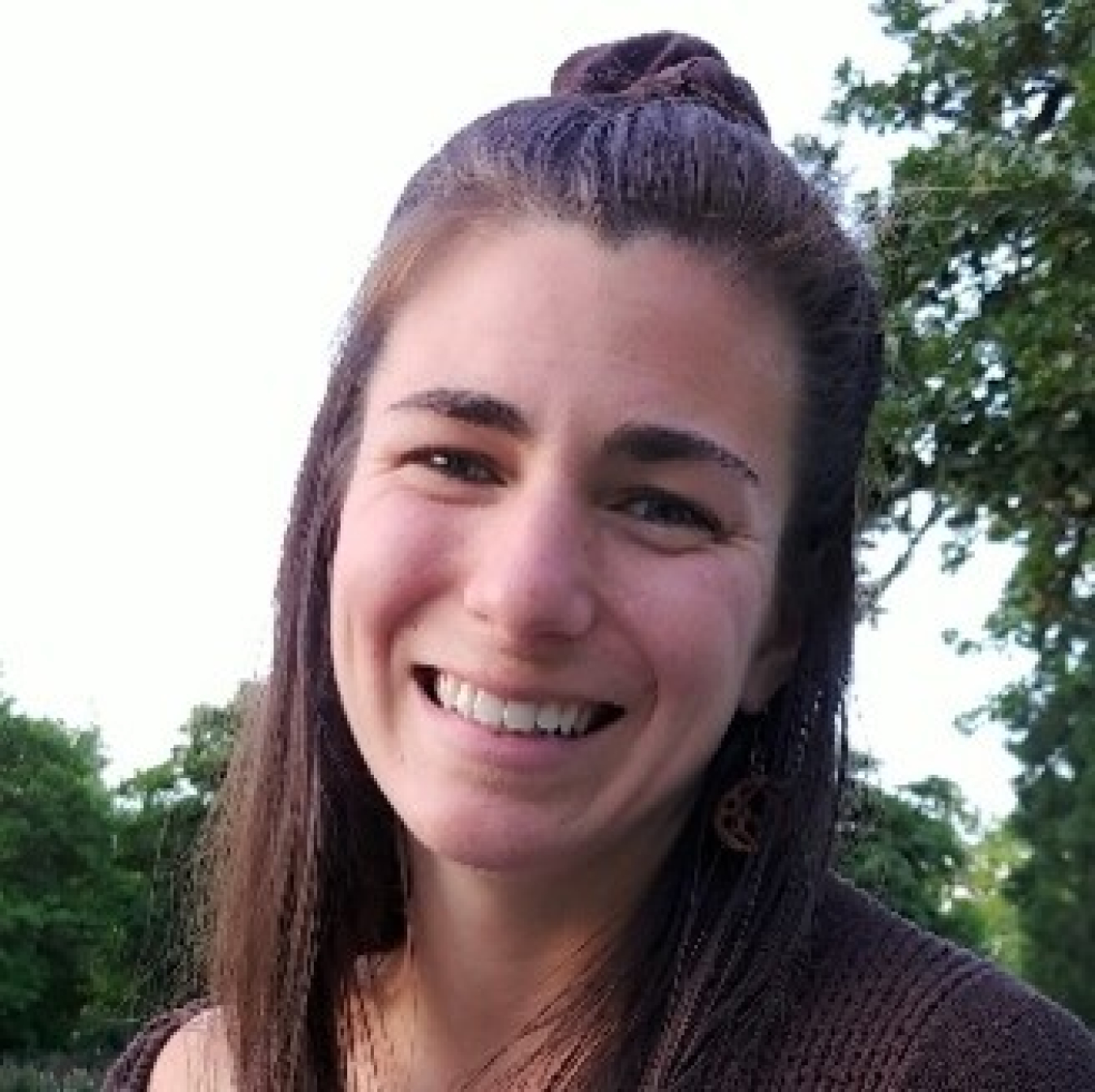 Headshot of a woman smiling.