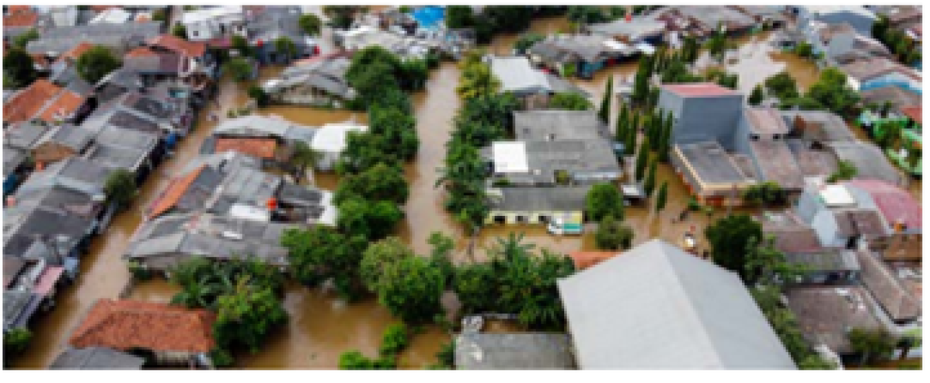 Residential homes surrounded by floodwater.