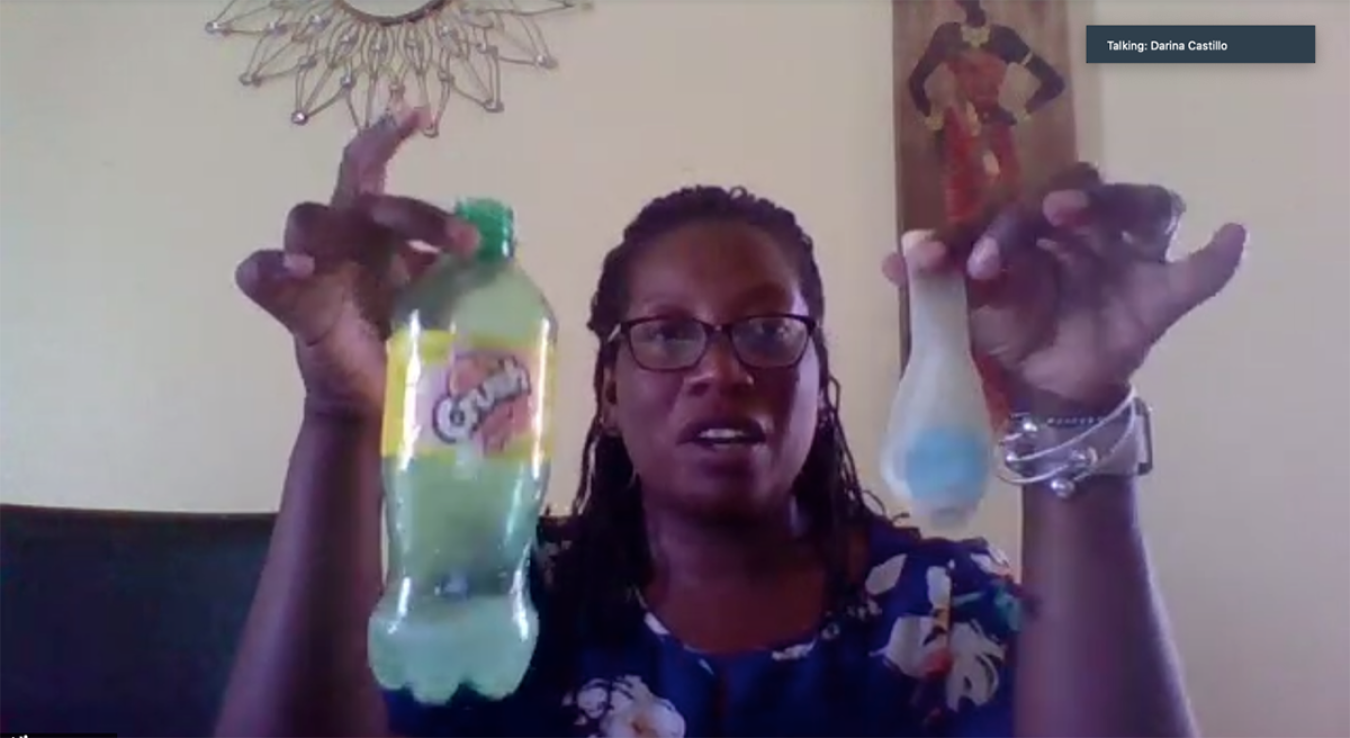 LM Site Manger Darina Castillo demonstrates a chemistry experiment in her online classroom. Castillo credits her exposure to STEM education as a reason for her professional success as an LM site manager.