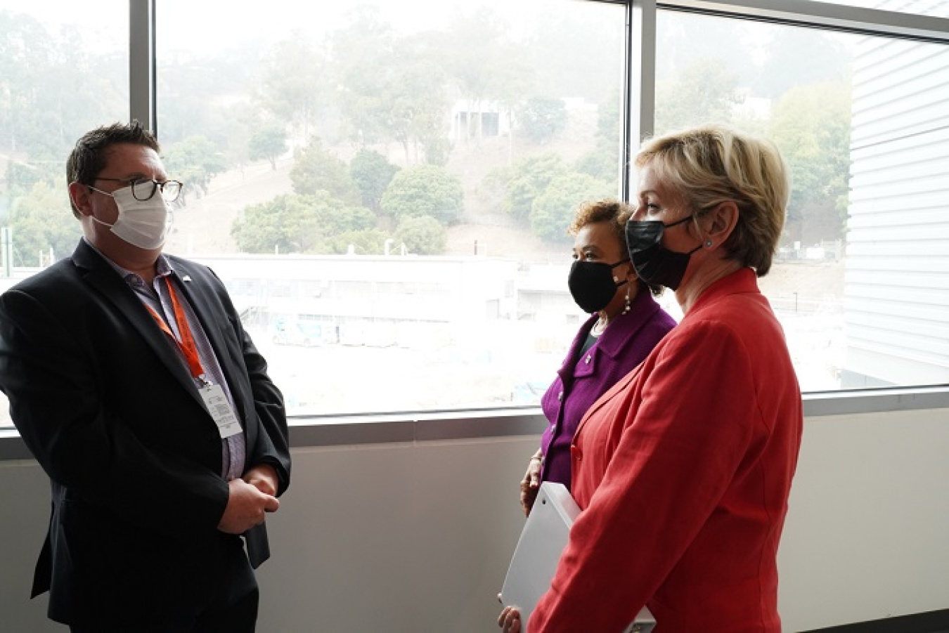 Energy Secretary Jennifer Granholm, far right, meets with U.S. Rep. Barbara Lee of California and DOE Joint Genome Institute Director Nigel Mouncey during an Aug. 20 visit to the Lawrence Berkeley National Laboratory.
