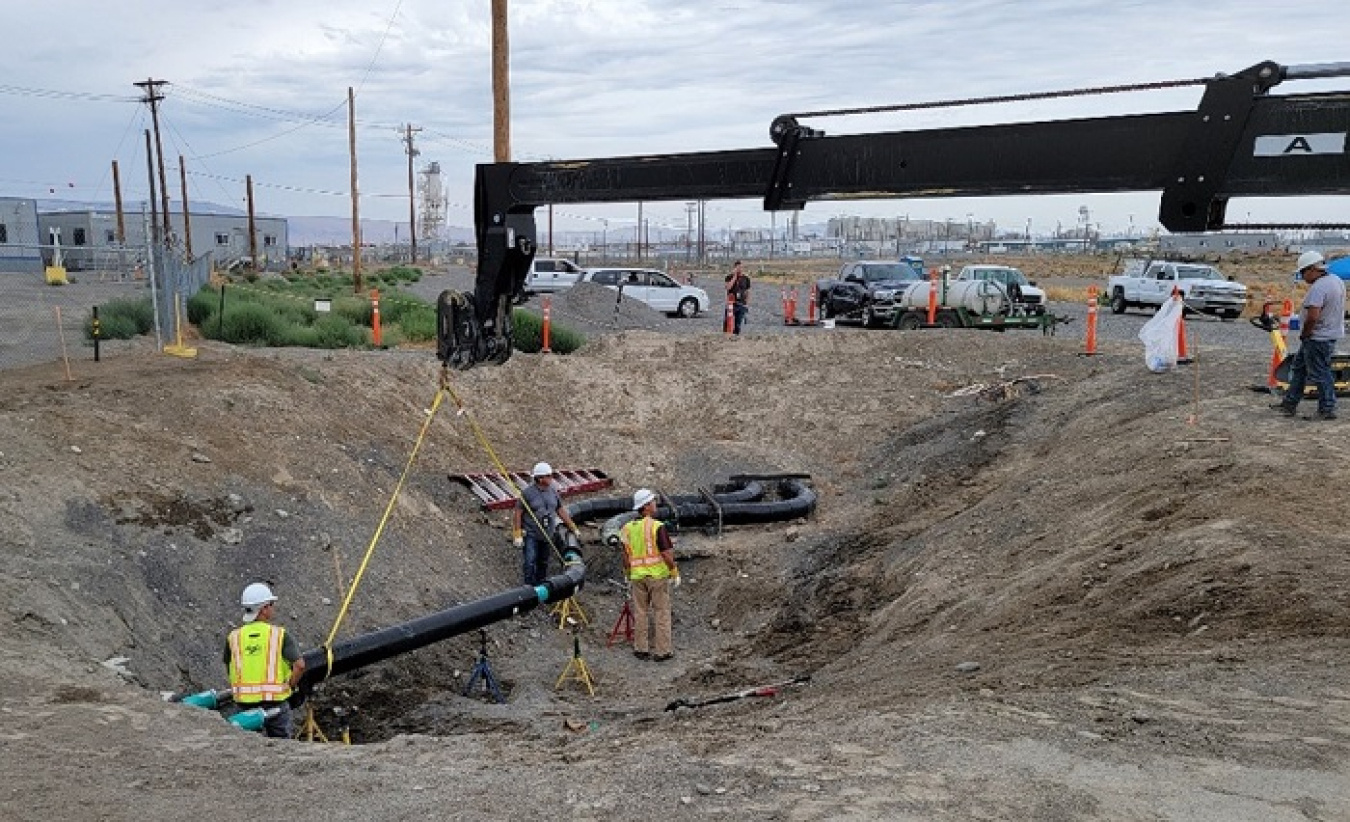 Crews with EM tank operations contractor Washington River Protection Solutions and subcontractor Apollo, Inc. fit the final sections of double-walled pipe in place, connecting the Hanford Site tank farms to the Waste Treatment and Immobilization Plant.