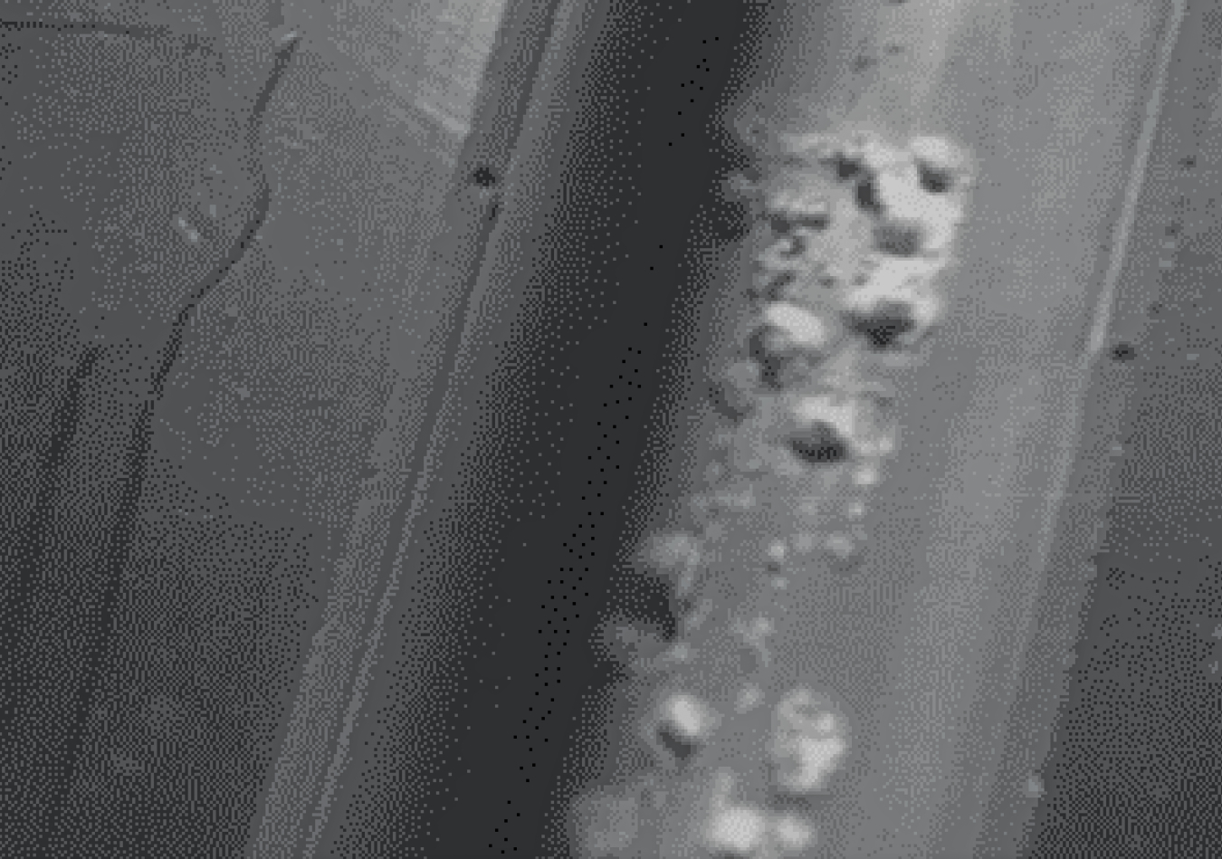 Fuel corrosion from long-term dry storage of spent nuclear fuel