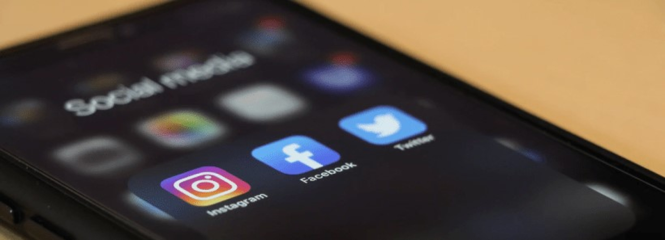 Social media icons on a phone.
