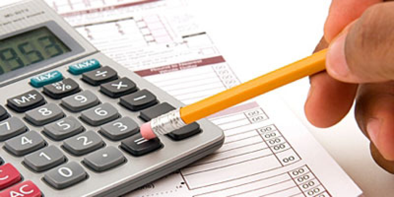 Person using calculator.