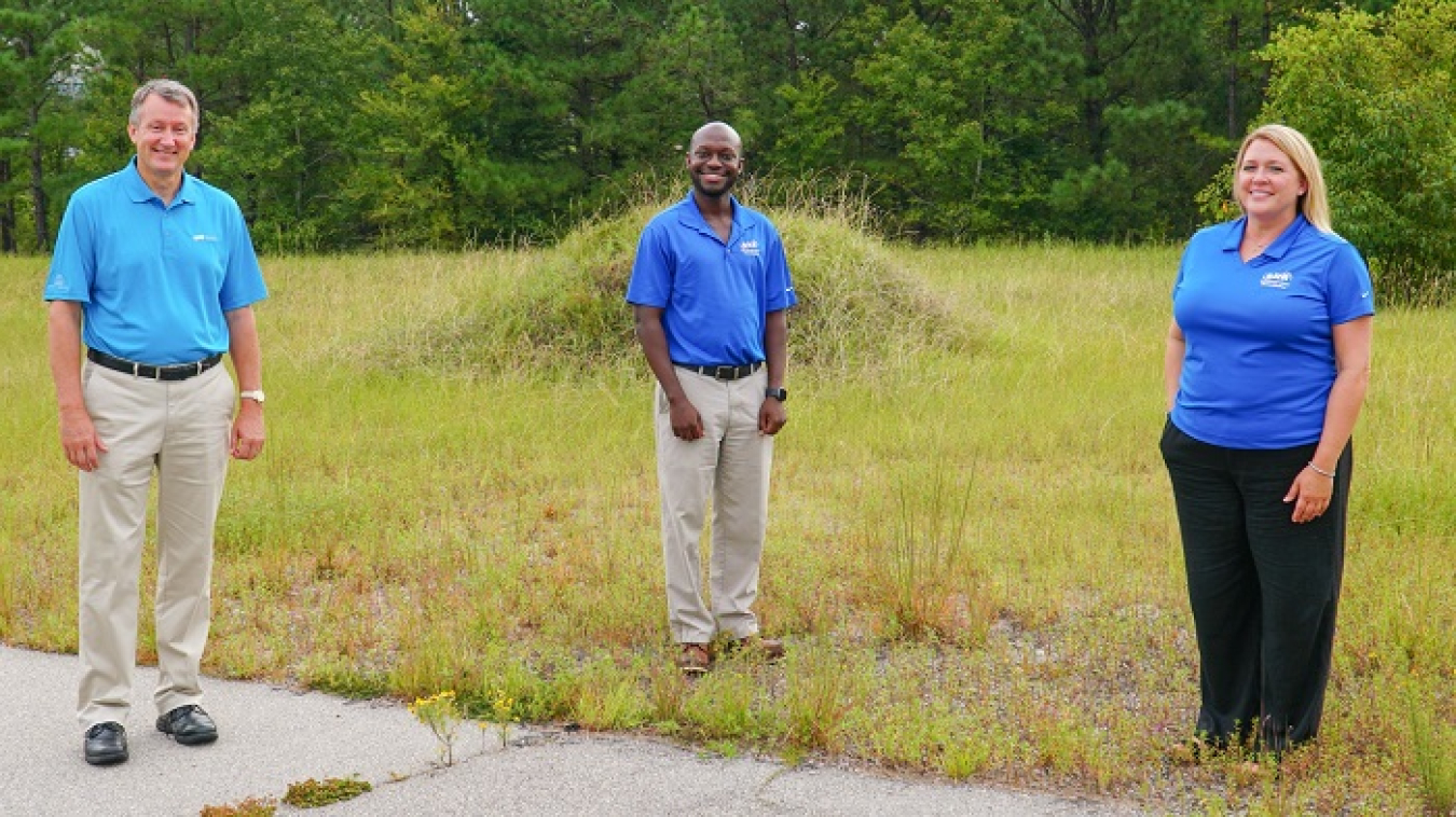 Savannah River Remediation (SRR) President and Project Manager Phil Breidenbach stands with SRR Defense Waste Processing Facility Engineer Frank Armstead and SRR Senior Recruiter Allison Brinkley.