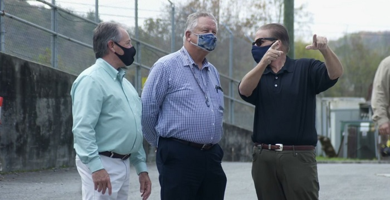 From left, Len Morgan, UCOR labor relations manager, Mike Thompson, Atomic Trades and Labor Council president, and Jimmy Hart, Metal Trades president, visit a project site where UCOR and labor employees are advancing cleanup in Oak Ridge.