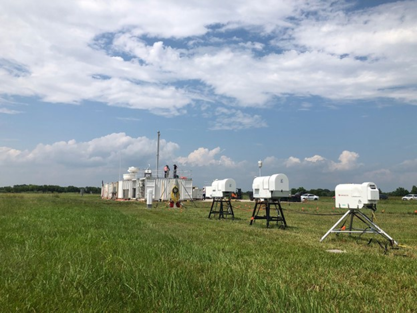 Clouds over the Department of Energy (DOE) Atmospheric Radiation Measurement (ARM) mobile user facility in La Porte, Texas, as researchers set up equipment for the TRacking Aerosol Convections interactions ExpeRiment (TRACER).