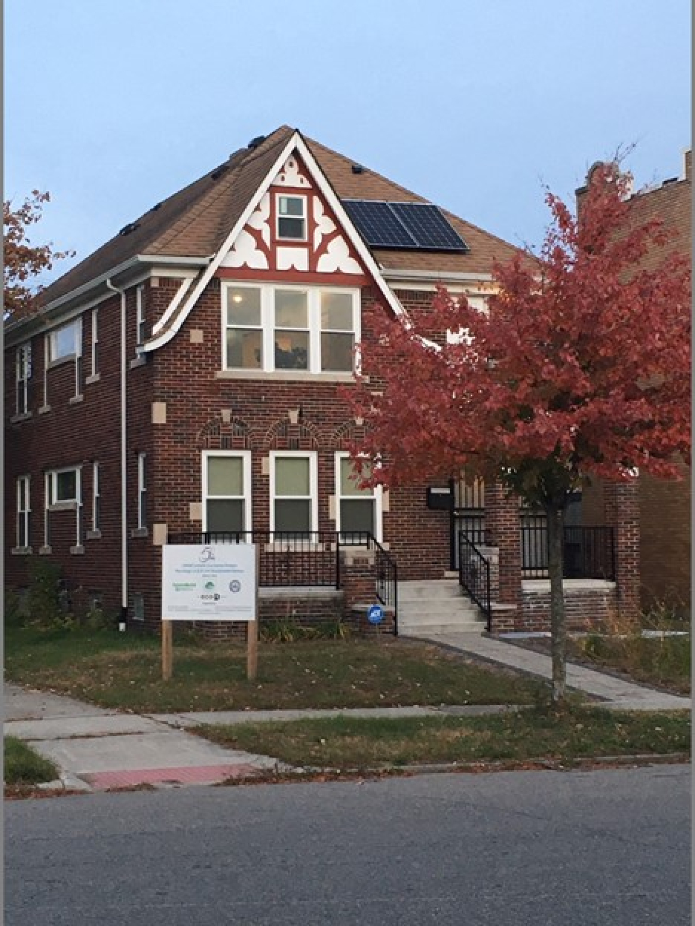 A building in HOPE Village in Washington, DC has solar panels on the roof.