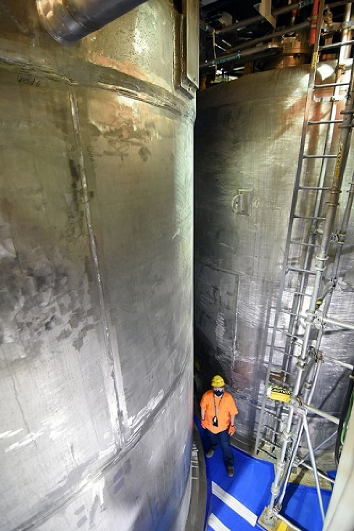 Laborer Sarah Orr, pictured, works near the effluent collection vessels in Hanford’s Effluent Management Facility.