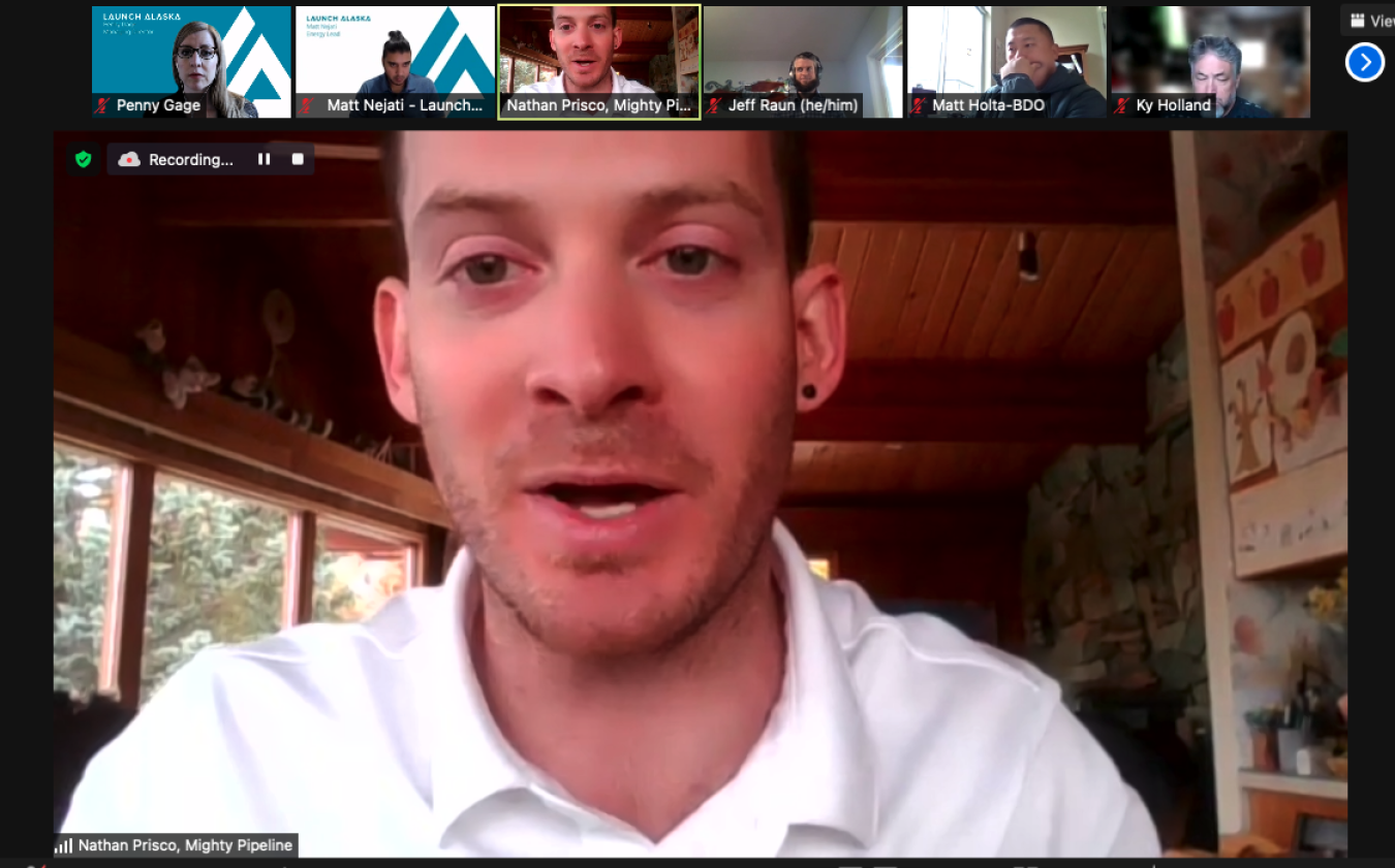 A screen shot of a Zoom meeting with the largest screen on Nathan Prisco.