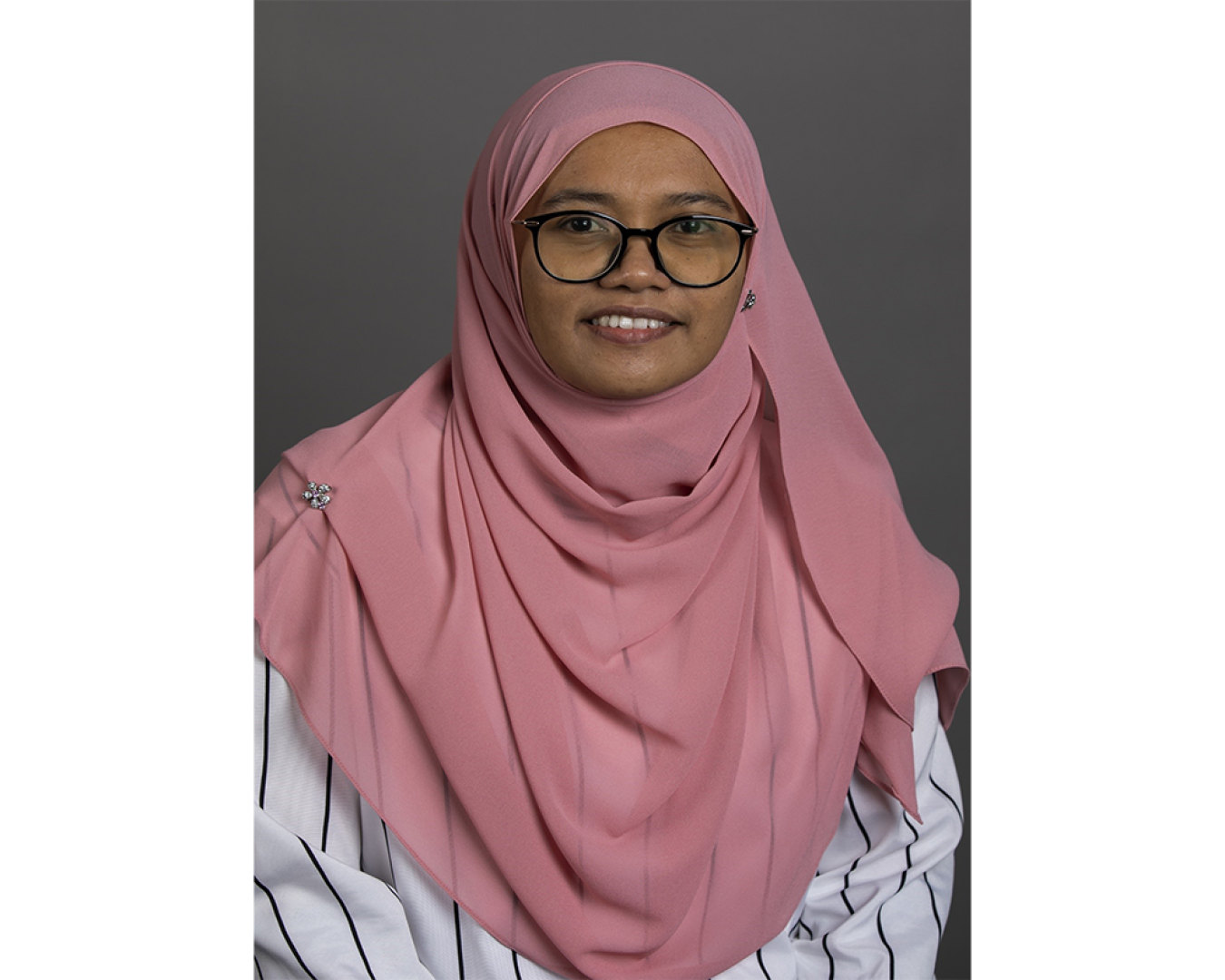 NETL research scientist Nor Farida Harun, Ph.D., received a Special Recognition Award for her work toward developing a smart electrical grid during the Women of Color (WOC) in STEM Conference — Digital Twin Experience (DTX), held in a virtual setting Oct. 7-9.