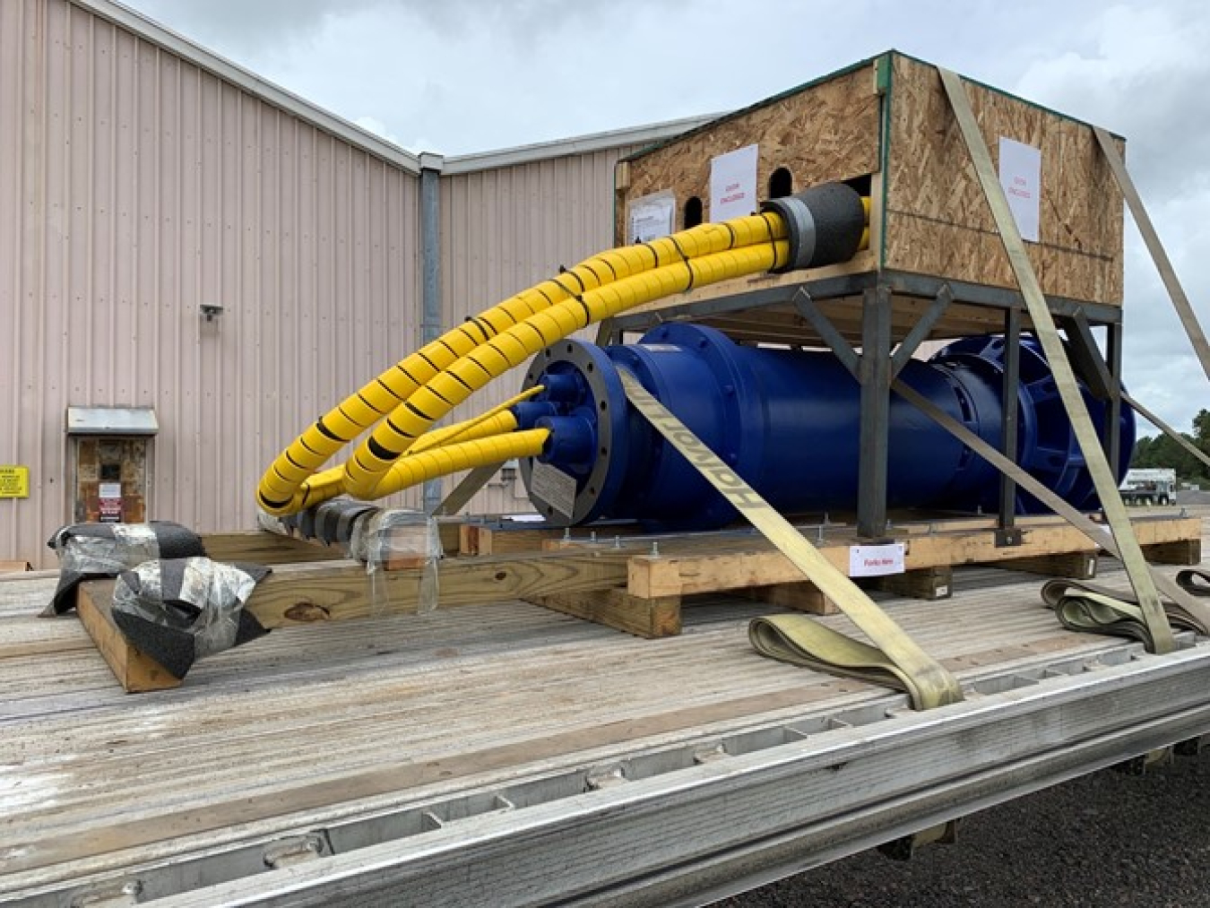 An enhanced commercial submersible mixer pump, designed by Savannah River Remediation for use in Tank 33 bulk waste removal efforts, arrives at the Savannah River Site.