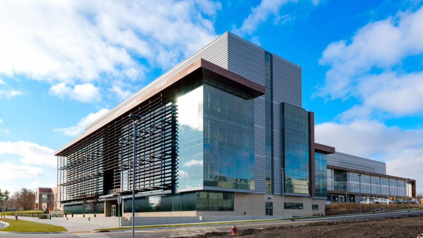 A glass and concrete building.