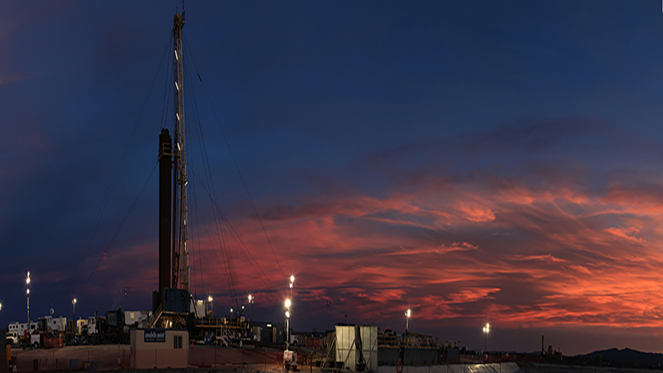 Sunset view of a drill site for a groundwater characterization well on Pahute Mesa at the Nevada National Security Site.