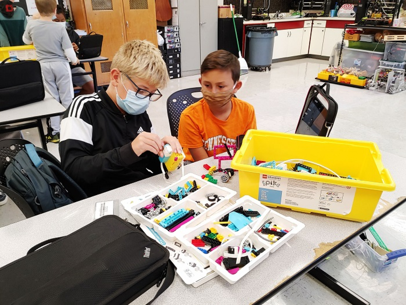 Students in Robertsville Middle School's science, technology, engineering, and math (STEM) program use newly purchased LEGO building block engineering kits to learn more about physics, mechanics, architecture, and programming.