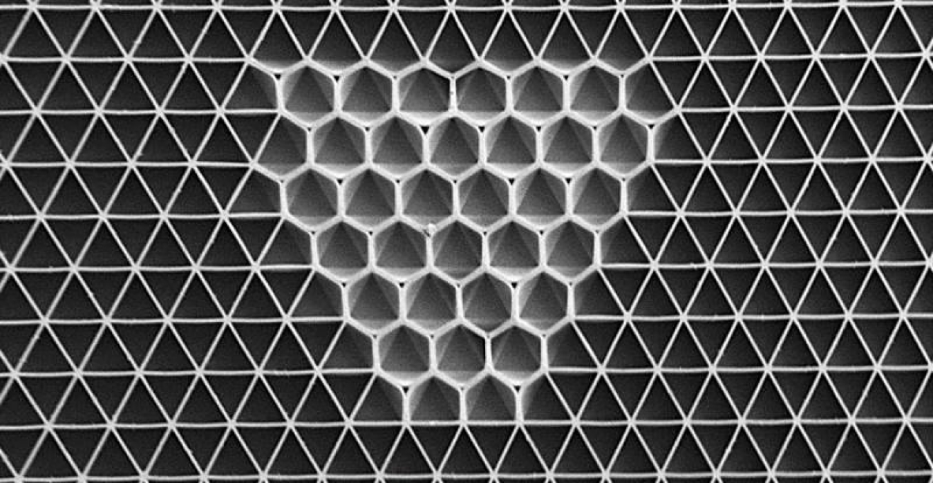 A drop of liquid applied to the center of a stiff triangular lattice softens and zips together the walls to transform the material into a hexagonal lattice.
