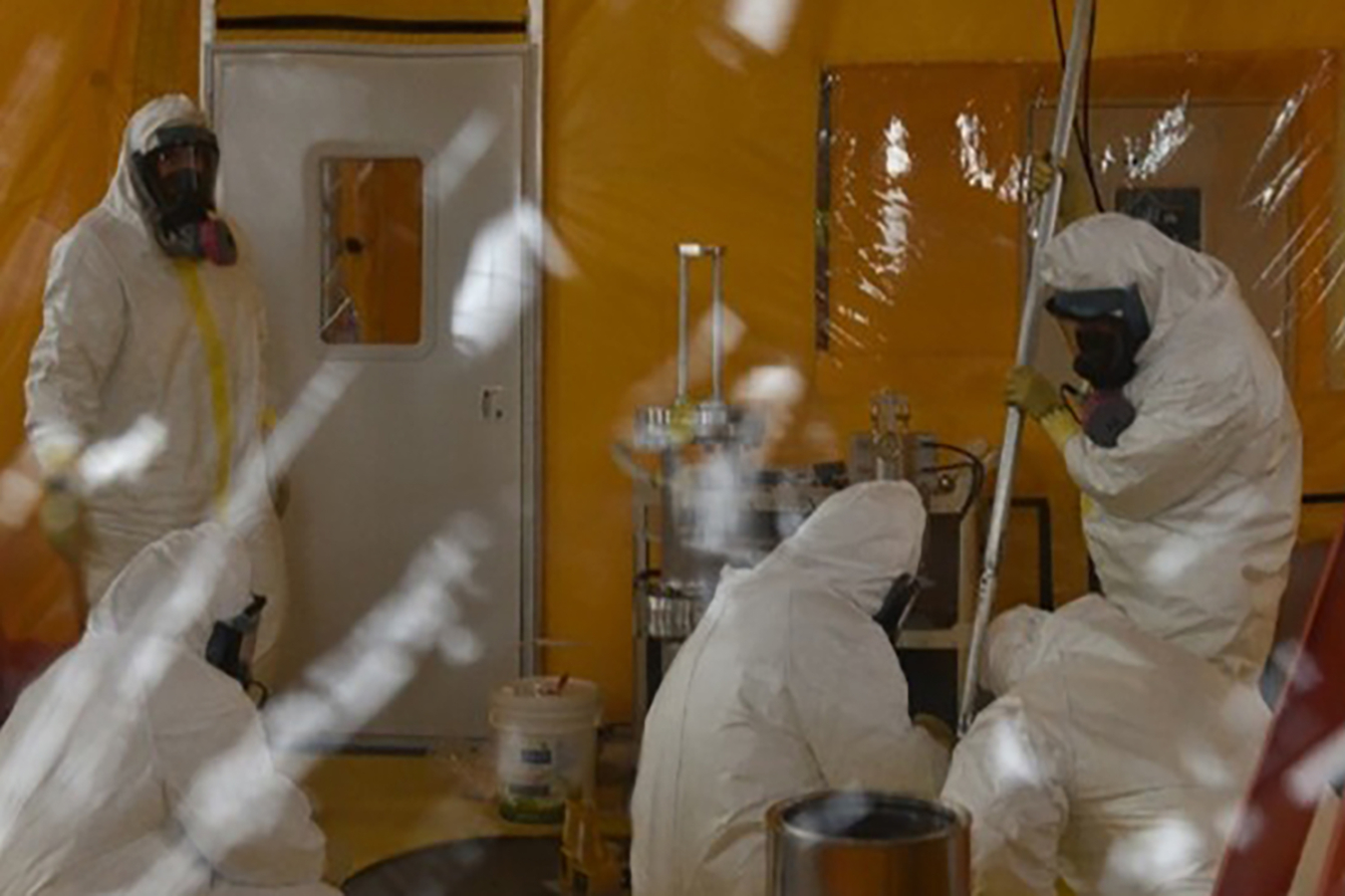 Team members from NNSA’s Plutonium Verification Team and Canadian Nuclear Laboratories assembling the tool used during the exercise.