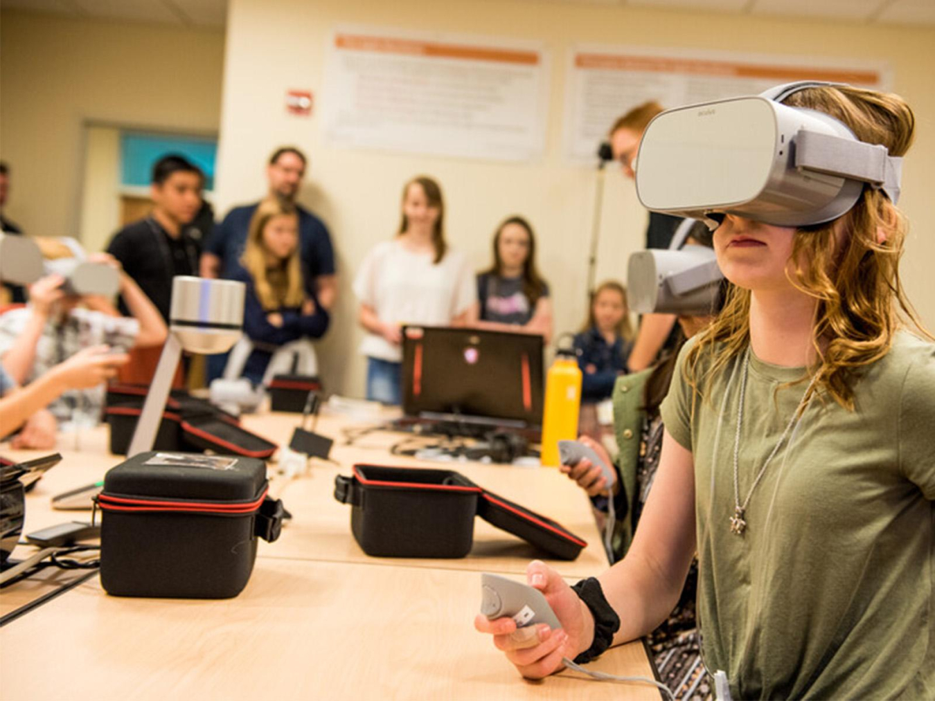 In this archived photo prior to the COVID-19 pandemic, students test out the Pacific Northwest National Laboratory’s Network Collapse game, viewable on Oculus.