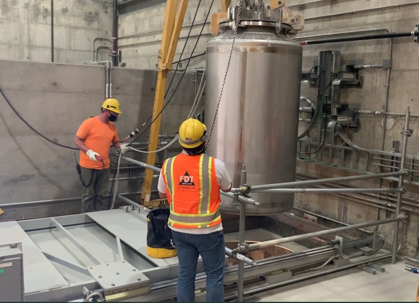 Workers at the Hanford Waste Treatment and Immobilization Plant test the Low-Activity Waste Facility’s container handling system.