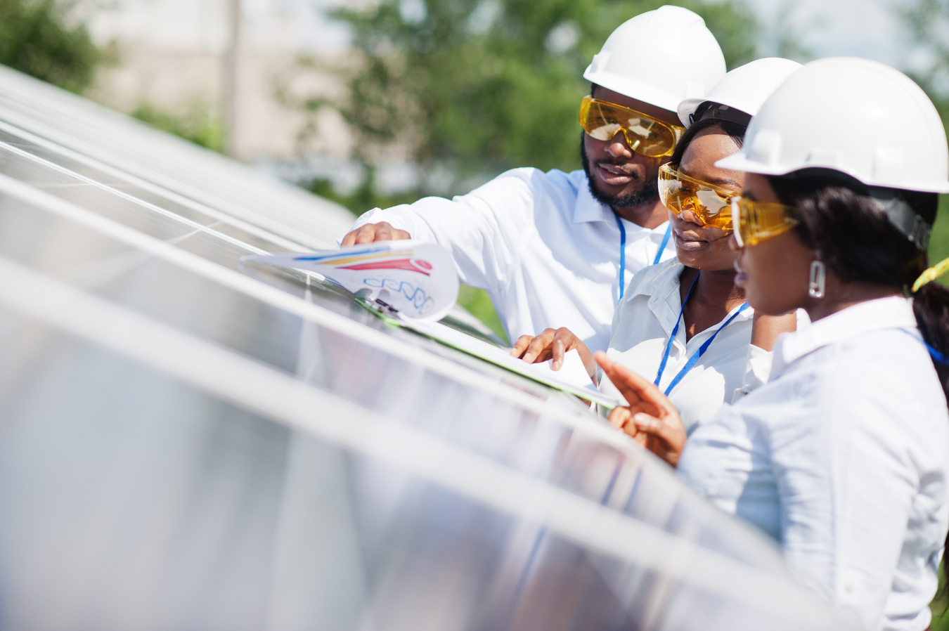 Workers installing solar panel
