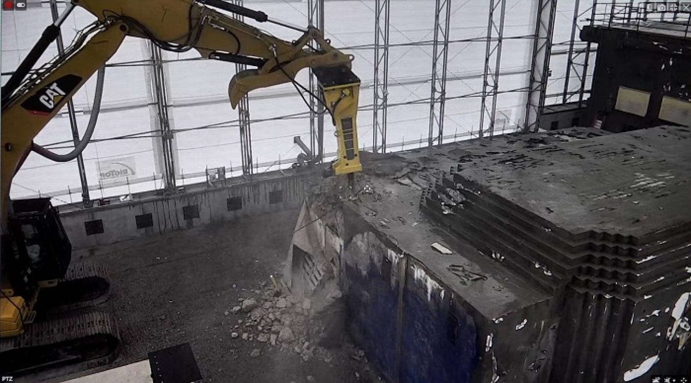 A view of the demolition of a hot cell inside a protective cover at the former Radioisotope Development Lab at Oak Ridge National Laboratory.