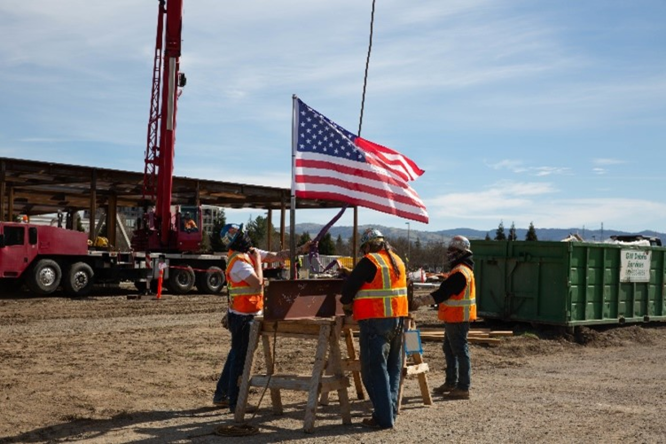 The final steel beam being signed by project managers and construction site workers for the LLNL Emergency Operations Center topping-off ceremony.