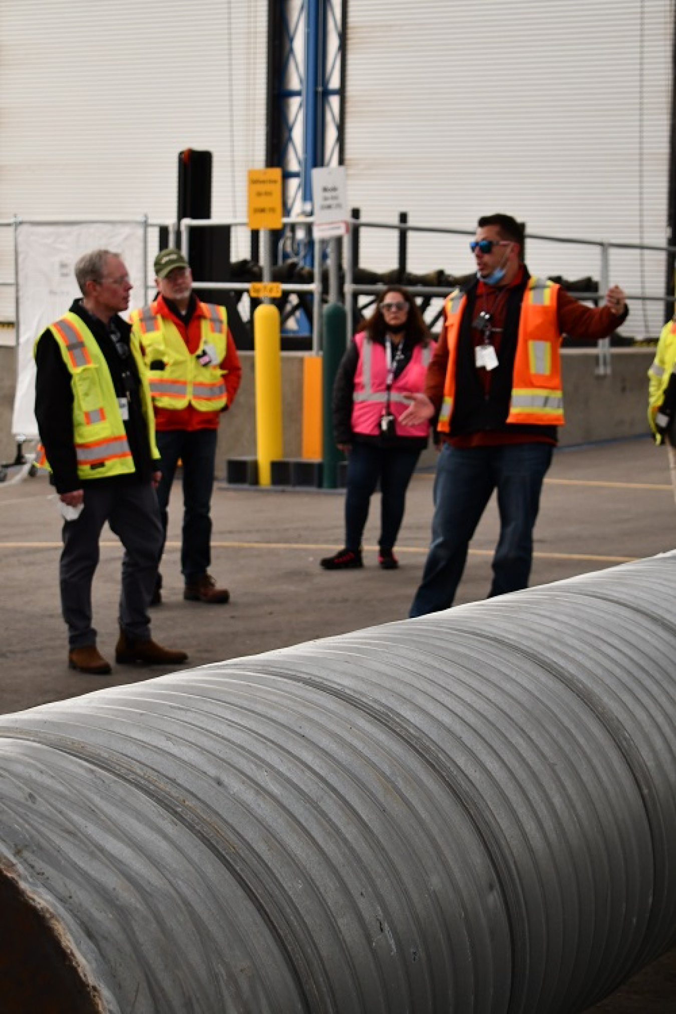 EM Senior Advisor William “Ike” White receives a briefing from Ellen Gammon, the Newport News Nuclear BWXT-Los Alamos (N3B) transuranic waste management director.