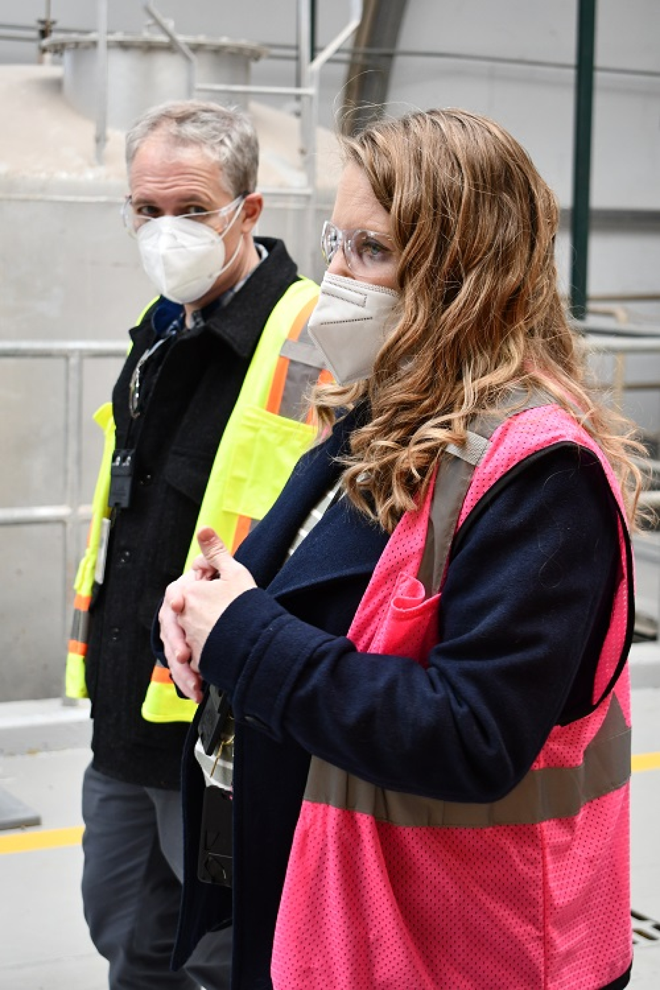 EM Senior Advisor William “Ike” White receives a briefing from Ellen Gammon, the Newport News Nuclear BWXT-Los Alamos (N3B) transuranic waste management director.