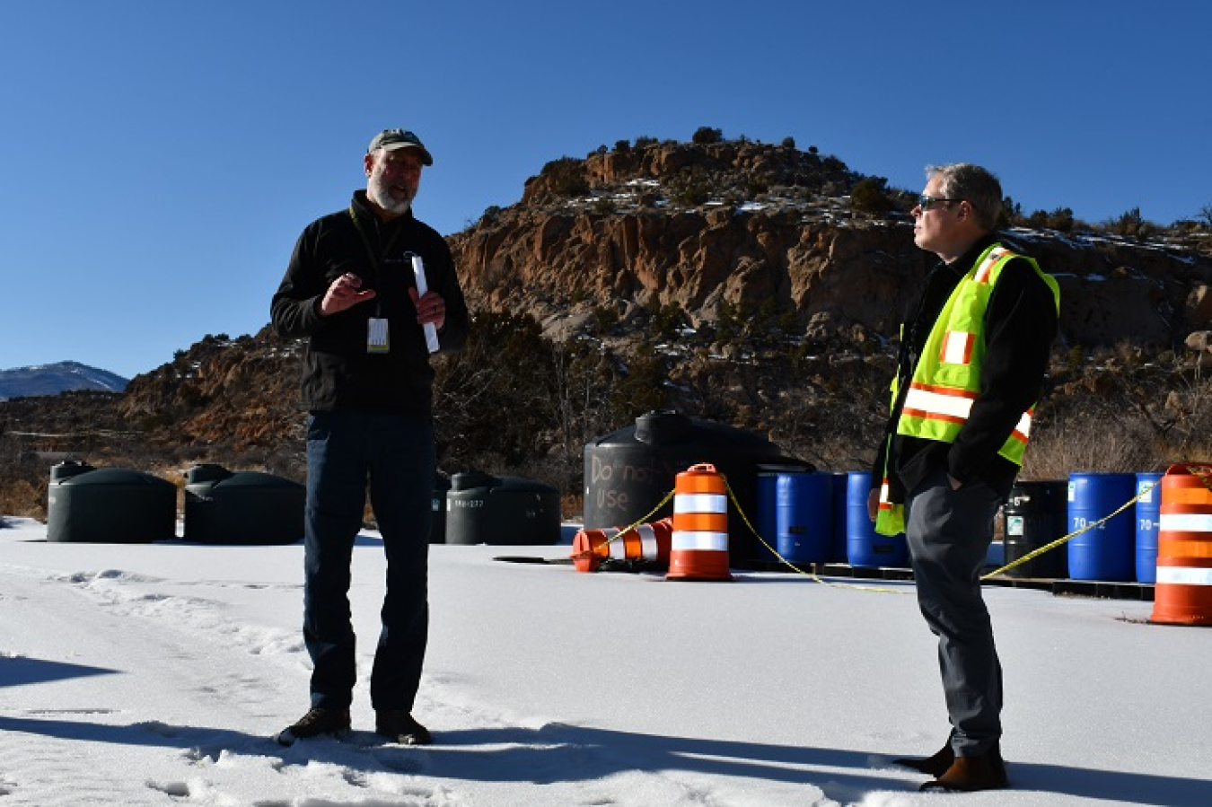 EM Senior Advisor William “Ike” White, at right, is briefed on progress to control migration of a plume contaminated with hexavalent chromium in groundwater beneath the Los Alamos National Laboratory (LANL) site.