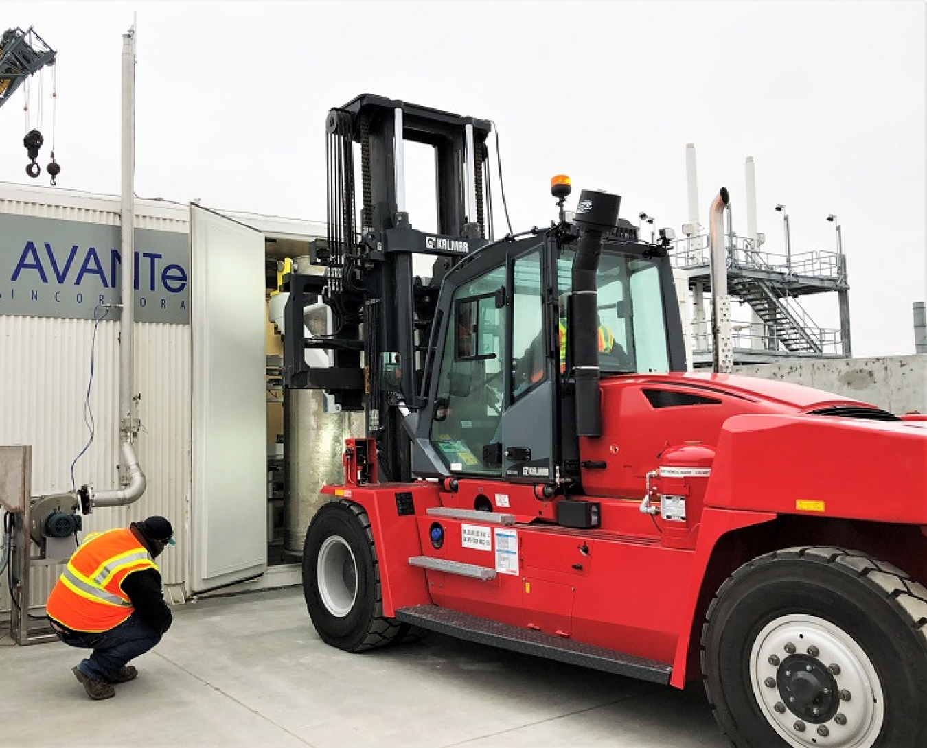 Workers install a 24,000-pound ion exchange column in the Tank-Side Cesium Removal System. The columns will remove cesium from waste destined for processing at the Waste Treatment and Immobilization Plant.