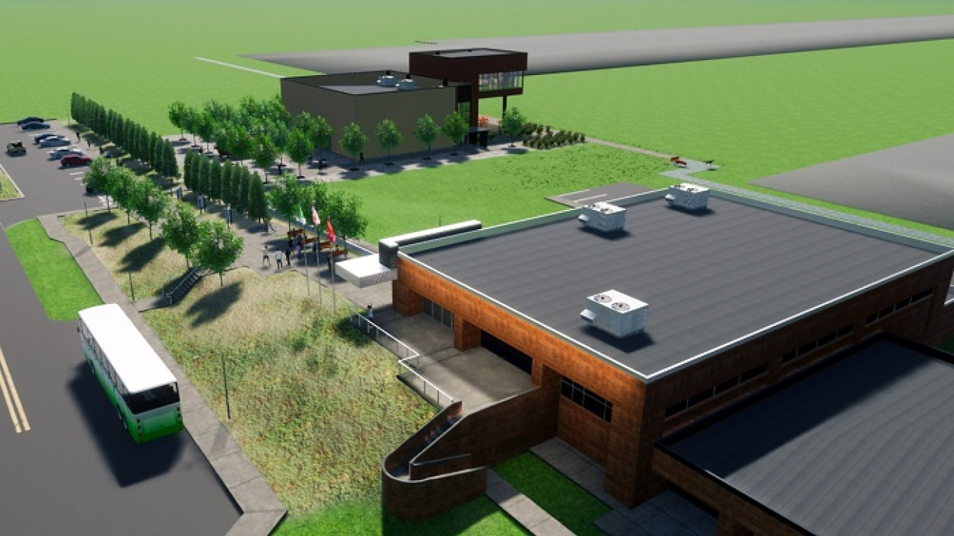 The K-25 Viewing Platform, in background, will be constructed next to the K-25 History Center and overlook the former K-25 building’s massive 44-acre footprint. The history center, which opened in 2020, is free to the public.