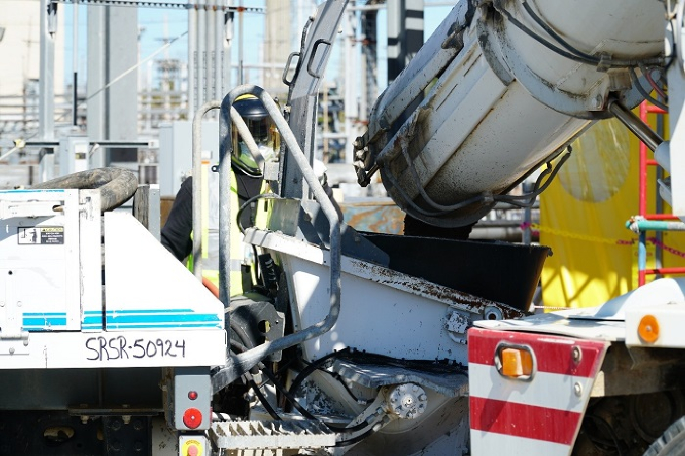 A Savannah River Remediation employee monitors grout as it flows to a diversion box in Savannah River Site’s F Tank Farm.