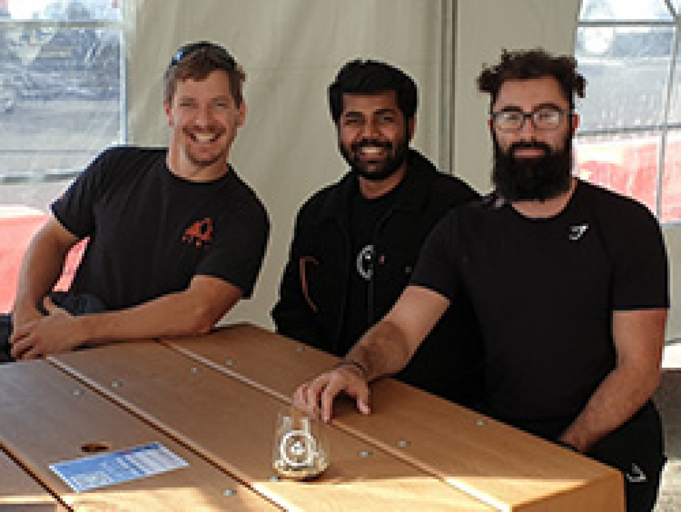 3 men smiling