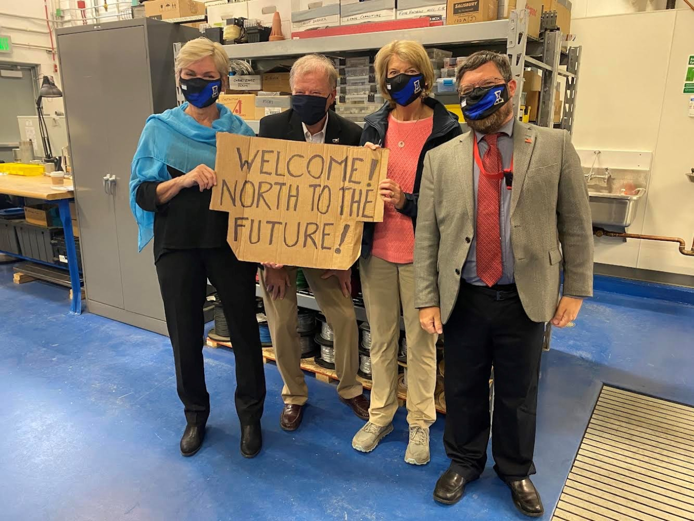 Secretary Granholm, Senator Murkowski, George Roe in Alaska with Welcome sign