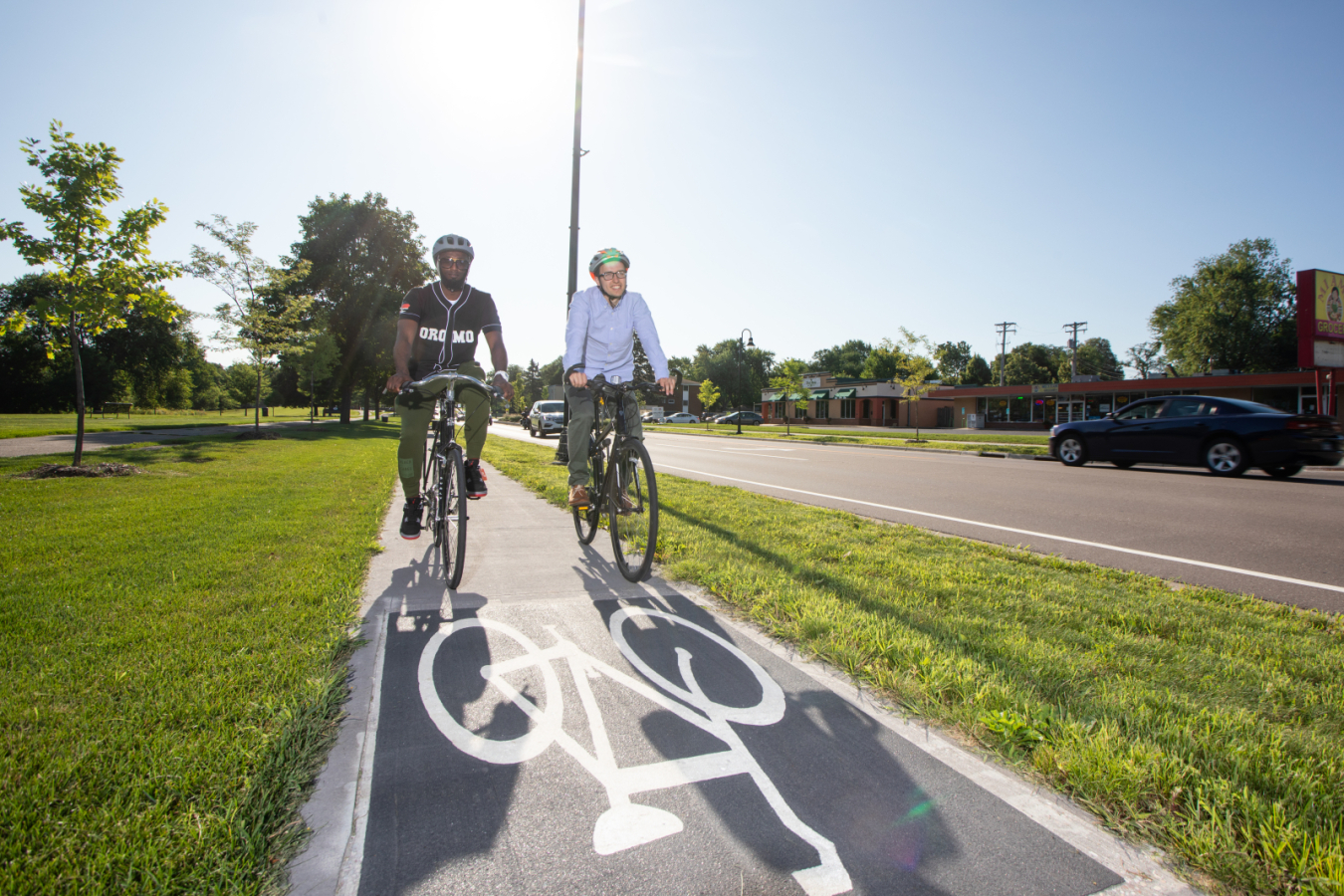 Two people riding bikes in Hennepin County, MN