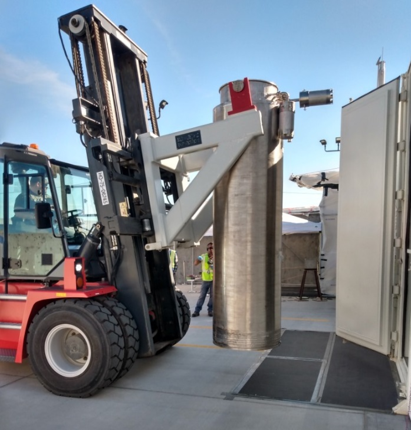 Workers with Hanford Site tank waste contractor Washington River Protection Solutions remove the first cesium-filled ion exchange column from the Tank-Side Cesium Removal System. 