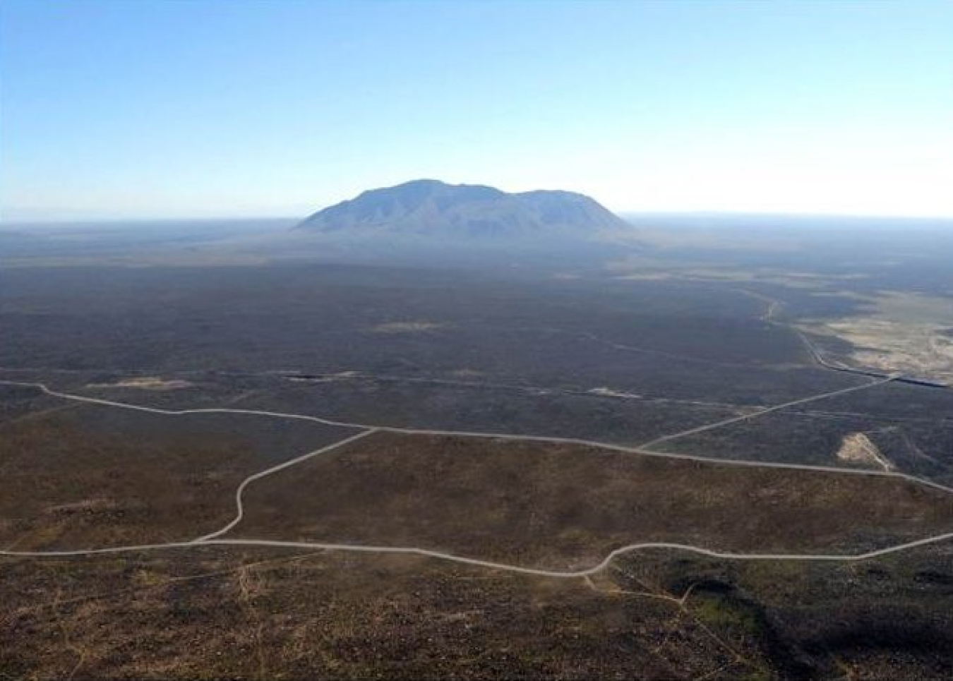 A rendering of what the Subsurface Disposal Area at the DOE Idaho National Laboratory Site would look like after an earthen cover is constructed over the entire 97-acre landfill. Construction of the cap is set to begin in two years.