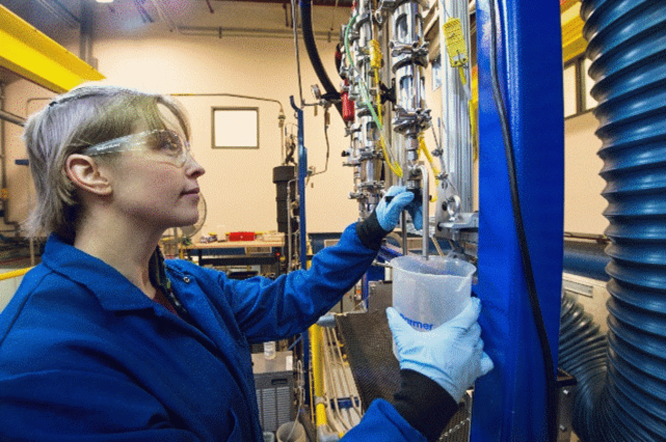 a person working with fuel samples in a lab