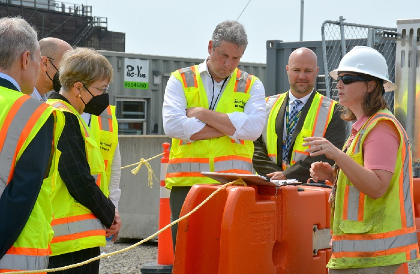 Danielle Stumbo, far right, of Fluor-BWXT Portsmouth, updates U.S. Reps. Tim Ryan, center, and Marcy Kaptur, center-left, on the Building X-326 demolition project at the Portsmouth Site.