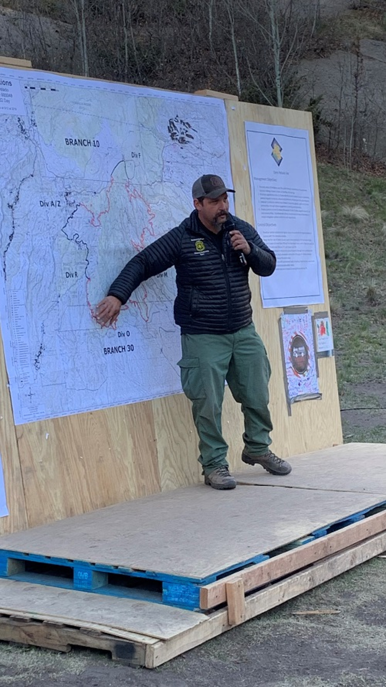 Fire Behavior Analyst Richard Burnside with the Great Basin Incident Management Team highlights the progress Great Basin Team 1 has made on containment lines for the Cerro Pelado fire.