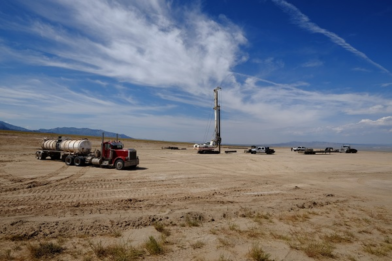 Utah FORGE site with tractor-trailer delivering well materials.