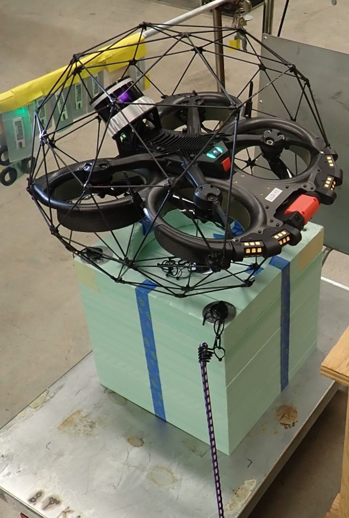 The drone pictured is being considered for use by EM’s calcine retrieval project at DOE’s Idaho National Laboratory Site to map piping and other obstructions inside a concrete vault. Information obtained from the drones would help employees prepare to access vessels containing calcine enclosed in the vault.