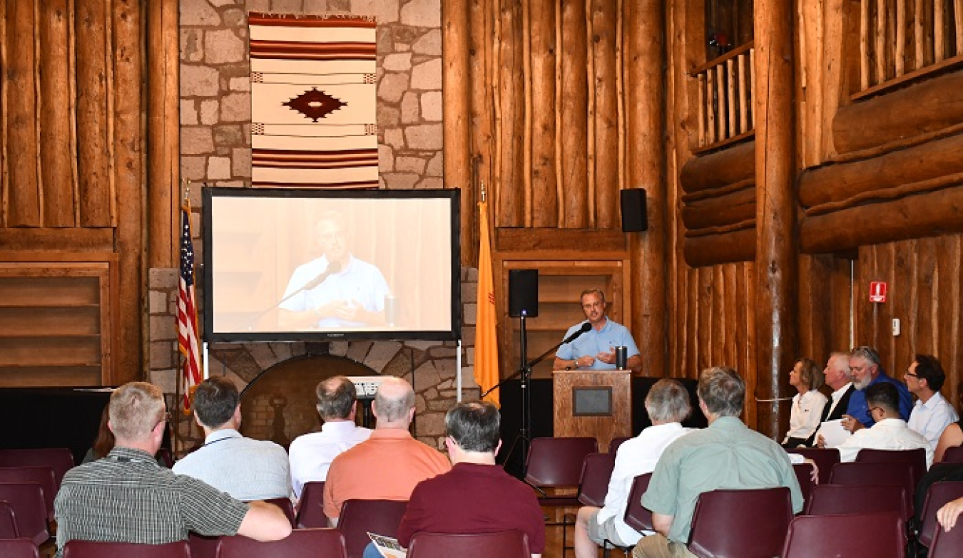 EM Los Alamos Field Office Manager Michael Mikolanis provides an update on the Los Alamos National Laboratory legacy cleanup for attendees at the Environmental Management Cleanup Forum held at Fuller Lodge in Los Alamos, New Mexico. 